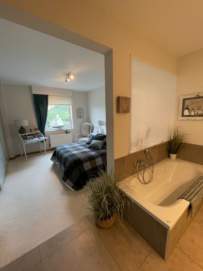 Ruim en en luxueus villa-appartement gelegen in een stijlvolle residentie vlakbij de historische windmolen Zuid-Abdijmolen! foto 9