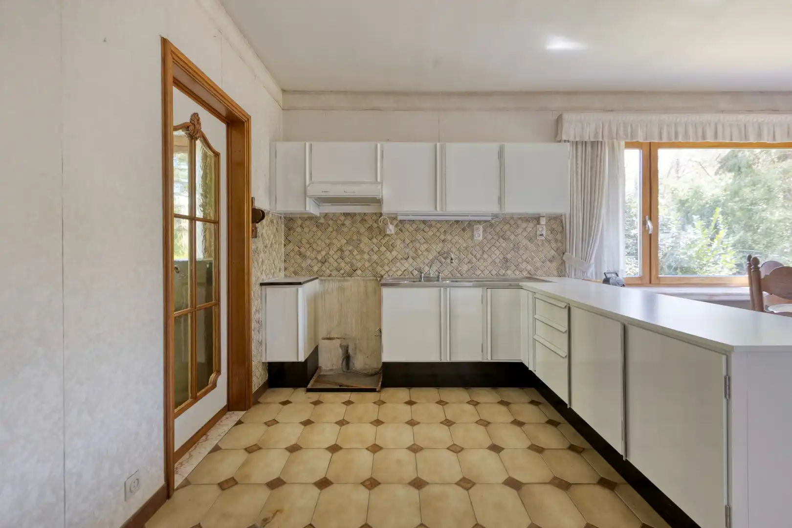 Rustig gelegen gelijkvloerse woning met 4 slpks op wandelafstand van het centrum van Mol !  foto 11