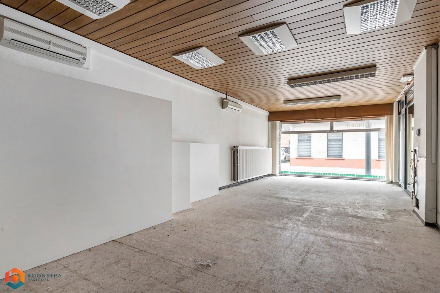 Handelsgelijkvloers met woonst en gezellige tuin in centrum Putte foto 21