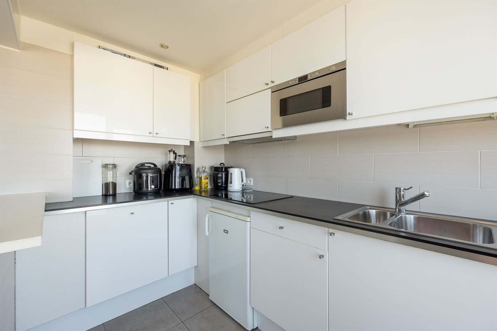 Ruim 2 slaapkamer appartement te Merksem foto 8