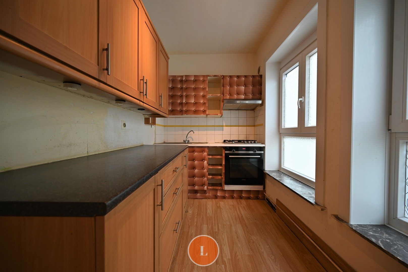 Opbrengsteigendom met 2 appartementen en 2 garages foto 4