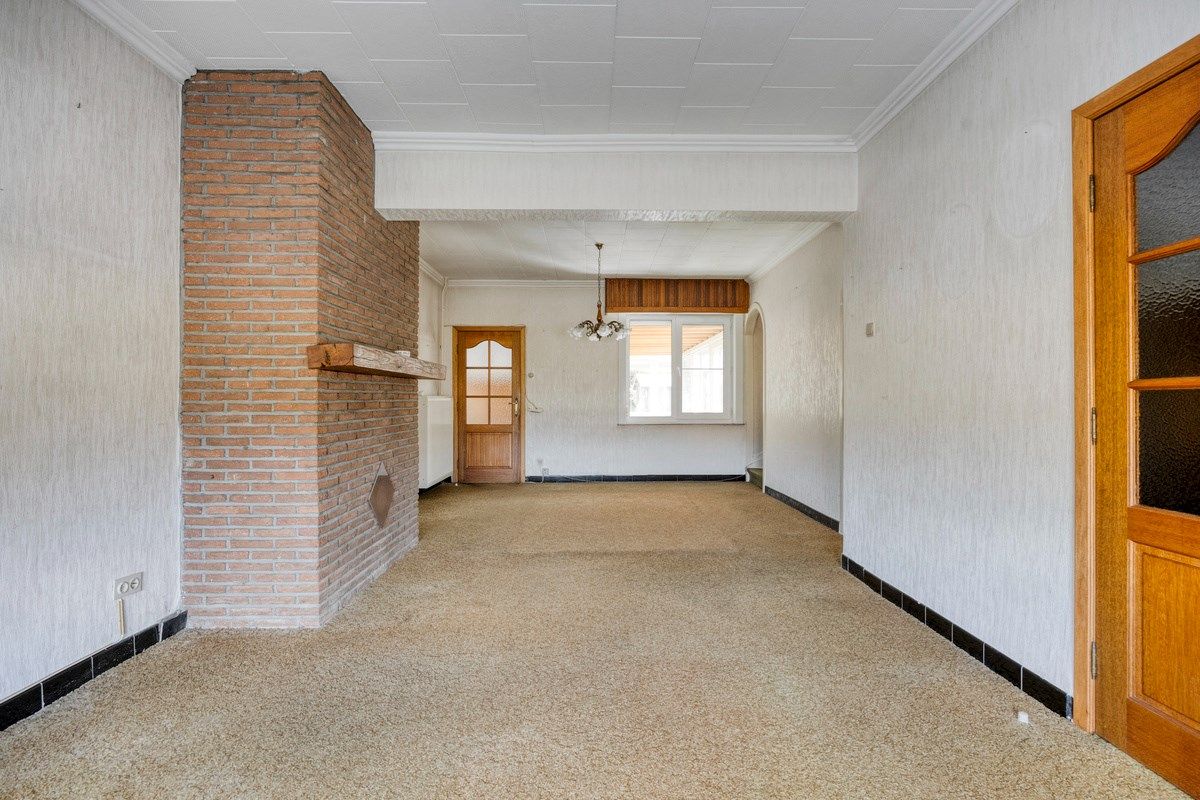 Ruim ingedeelde woning met 3slpks op een gunstige ligging. foto 2