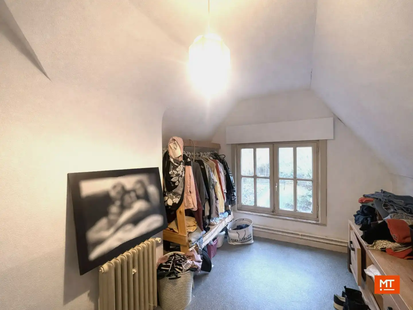 Alleenstaande woning met 3 slaapkamers (4 mogelijk), garage en tuin (ZW) te koop in Langemark foto 10