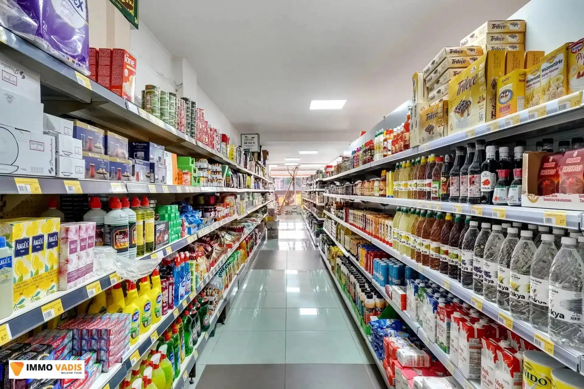 Handelspand met woonst en naastliggende woning foto 5