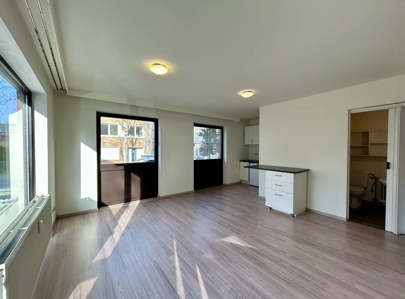 Gelijkvloerse flat met autostaanplaats op topligging binnen de Leuvense ring foto 6