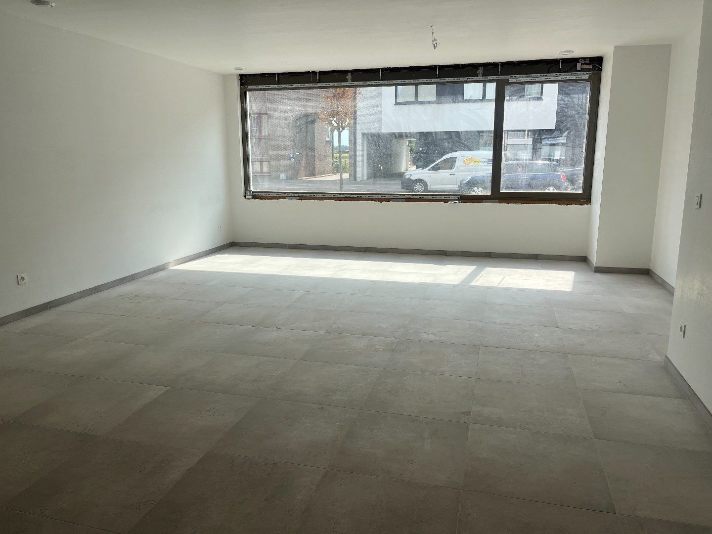 Gelijkvloers appartement met tuin in hartje Sijsele! foto 3