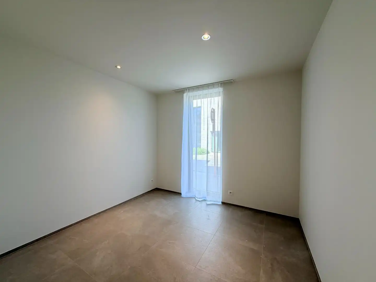 Gelijkvloers nieuwbouwappartement met uitzonderlijk E-peil te centrum Tielt! foto 10