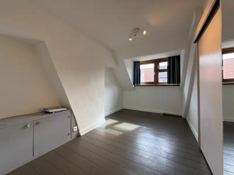 Lichtrijk duplexappartement met terras op wandelafstand van de Markt foto 12
