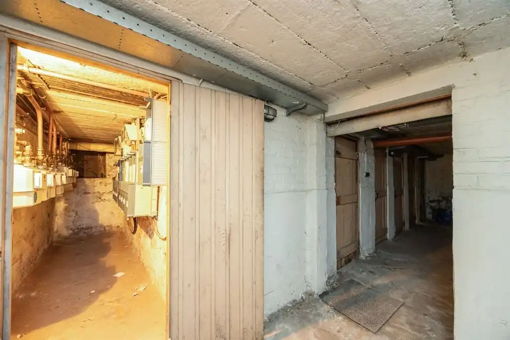 Instapklaar gelijkvloers appartement met gezellige koer foto 17