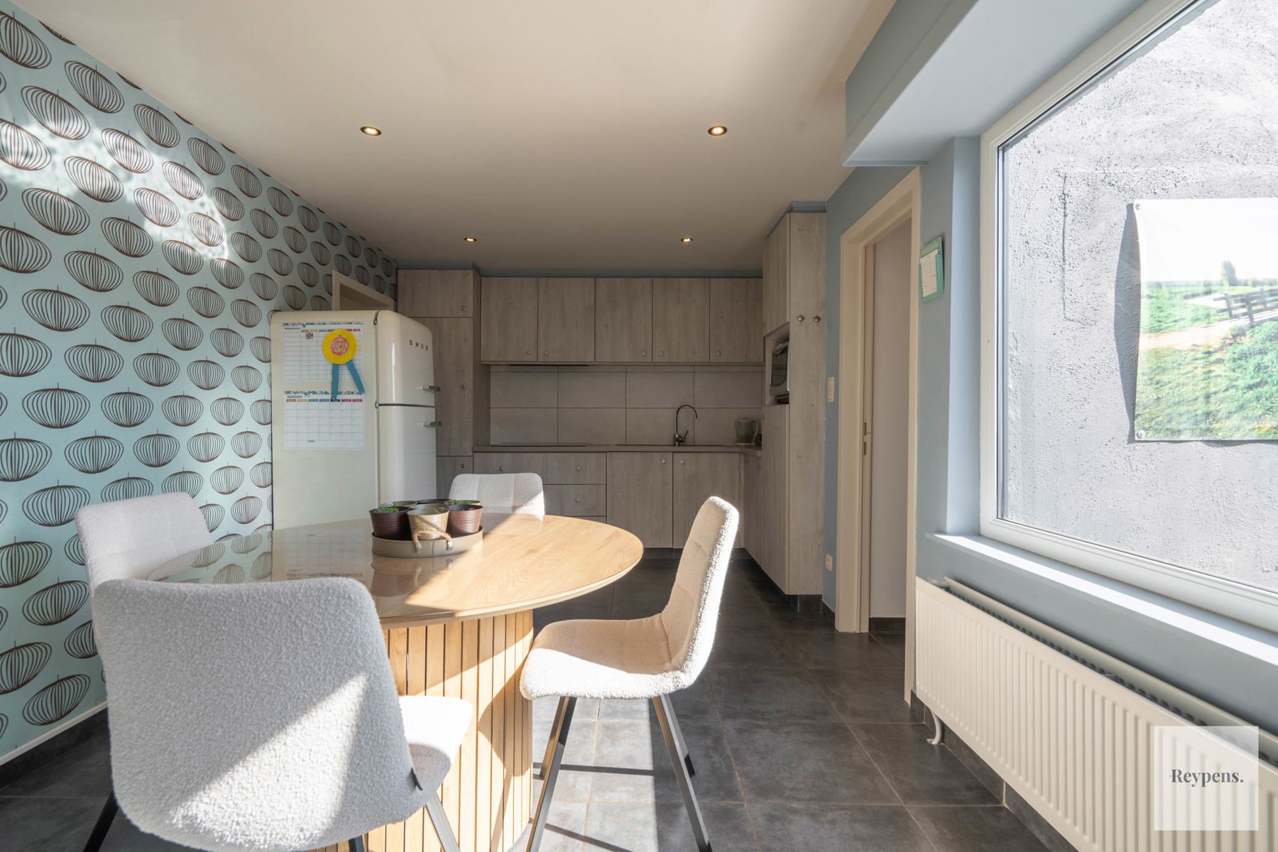 Instapklare woning met grote zonnige tuin op toplocatie! foto 8