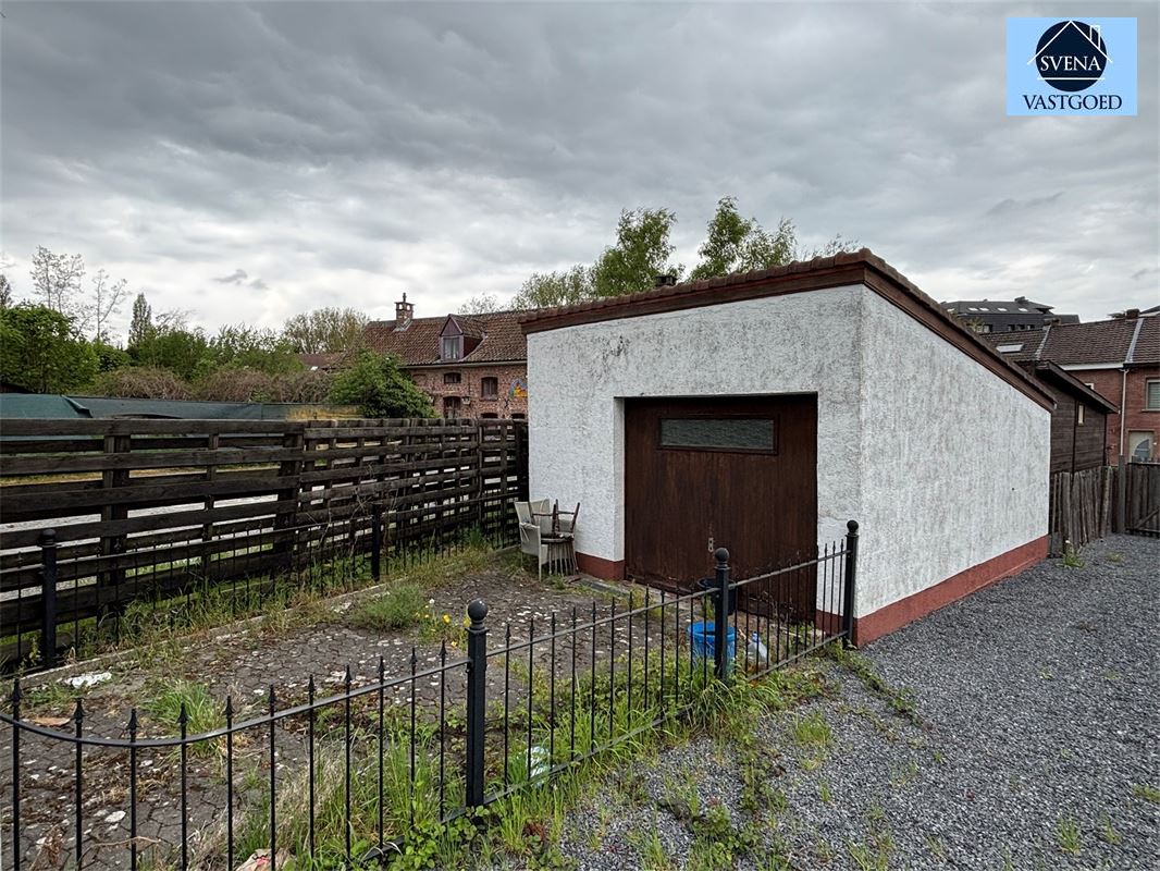 MOOIE WONING MET TUIN EN GARAGE foto 8