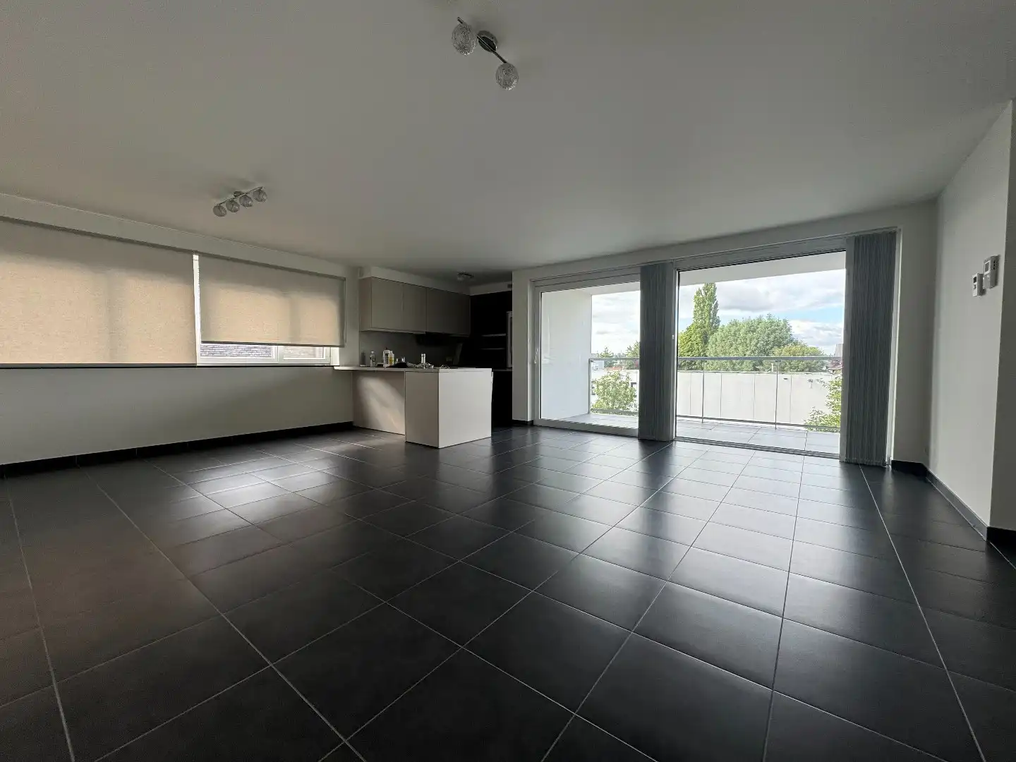 Te huur in Merchtem: ruim appartement 2 slpk + 2 autostaanplaatsen + kelder foto 2