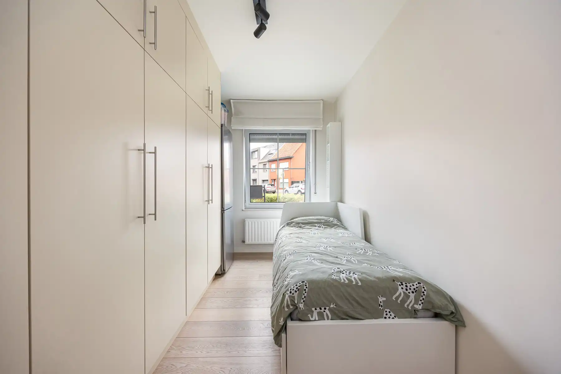 Gelijkvloers appartement met 2 slaapkamers, tuin en autostaanplaats.  foto 12