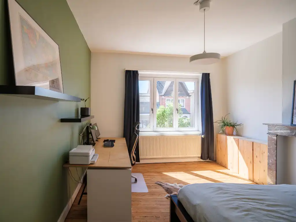 Karaktervolle gezinswoning met o.m. vier slaapkamers, gelegen in de gegeerde stationsbuurt. foto 17