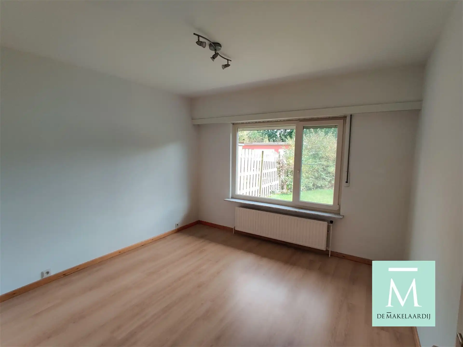 Centraal gelegen gelijkvloersappartement met 2 slaapkamers en tuin! foto 6