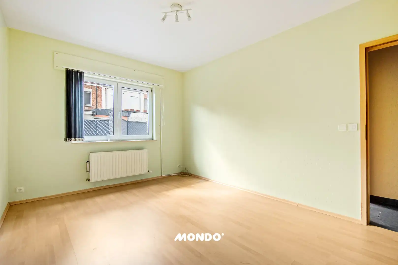 Gelijkvloers appartement met staanplaats en kelderberging! foto 8