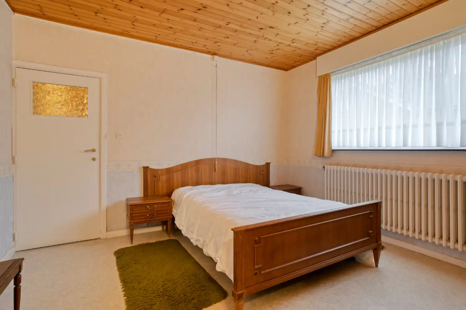 Verzorgde bungalow op topligging met 2 slaapkamers, inpandige garage en zonnige tuin foto 10