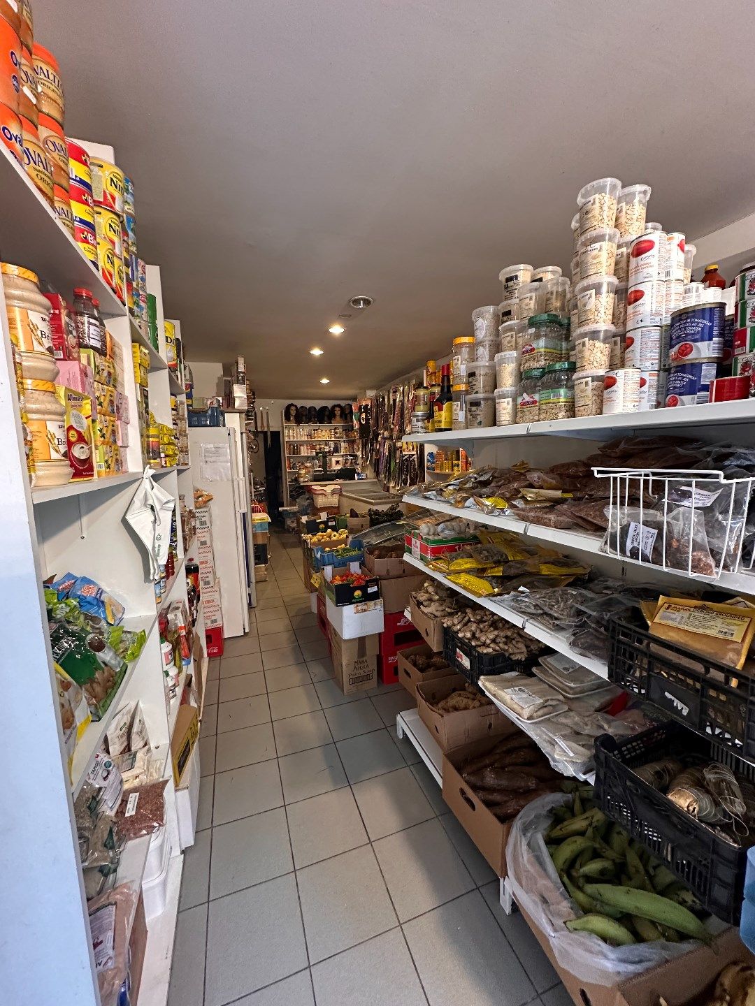 OPBRENGSTEIGENDOM : handelspand met duplex appartement. foto 3