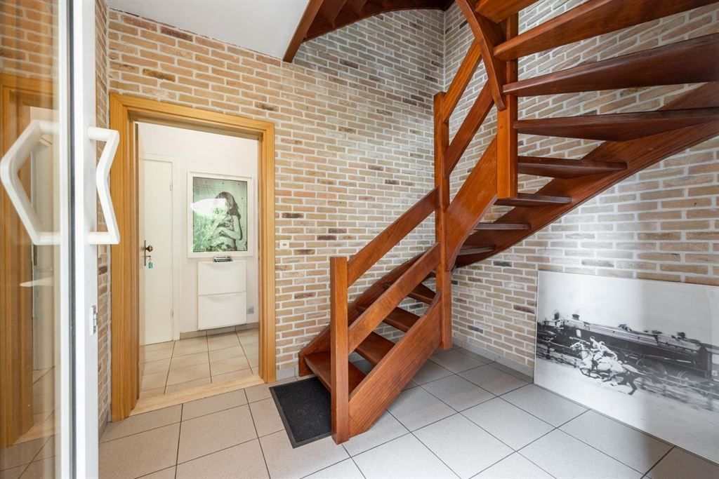 Gelijkvloers appartement met grote tuin foto 16