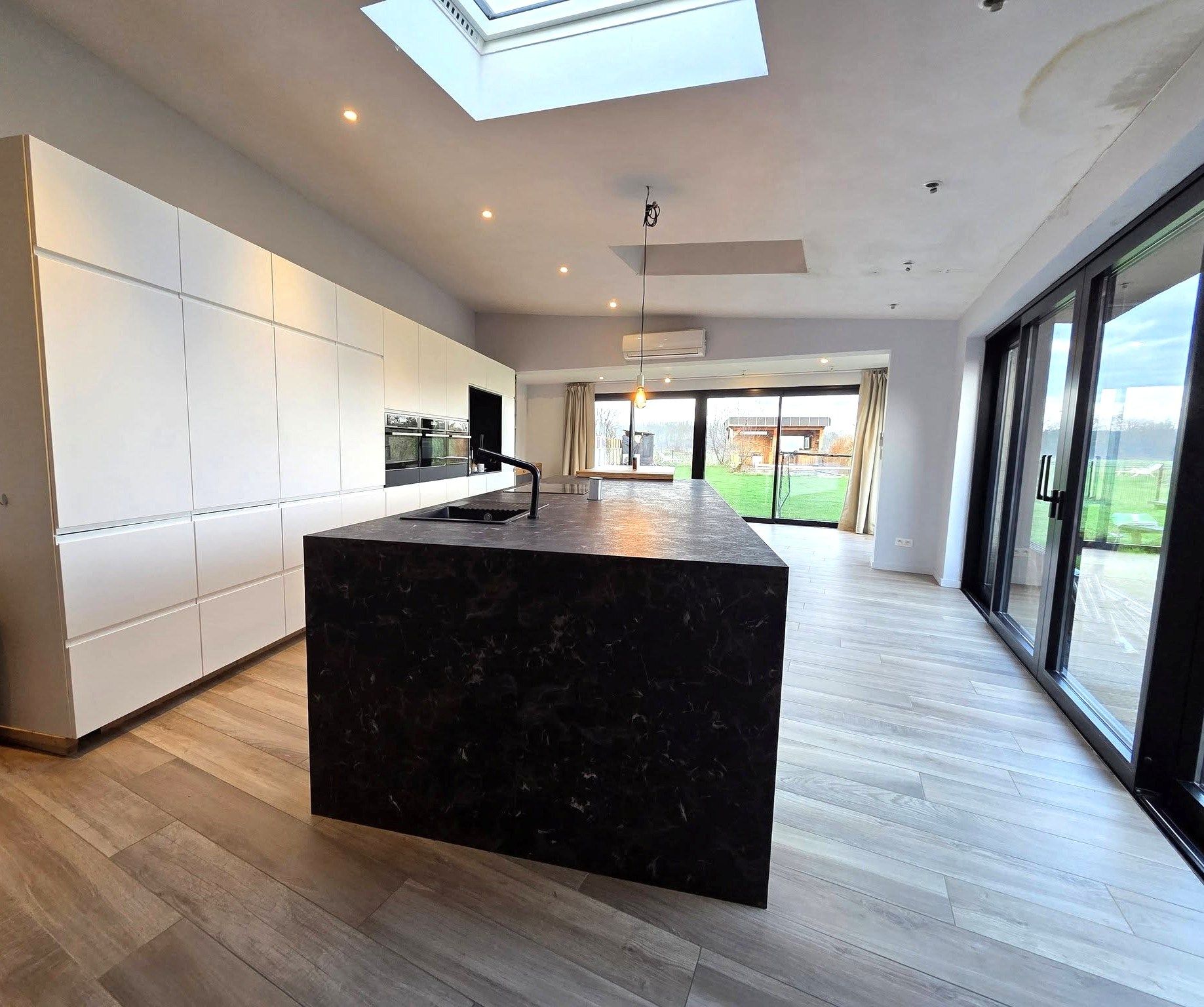 Charmante 3-gevelwoning in groene omgeving te Perk foto 8