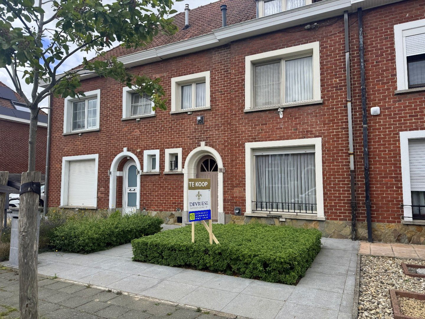 Hoofdfoto van de publicatie: Ruime tussenwoning met 3 slaapkamers (mogelijkheid tot meer!), garage en tuin te koop in Gullegem