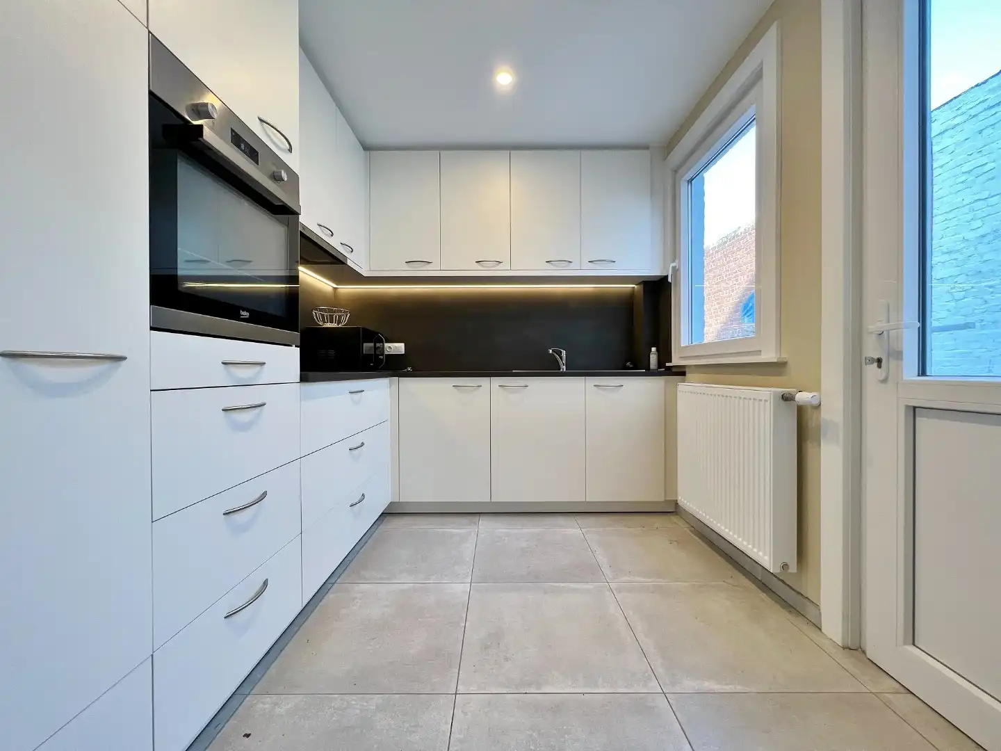 Centraal gelegen rijwoning met 4 slaapkamers en tuin.  foto 6
