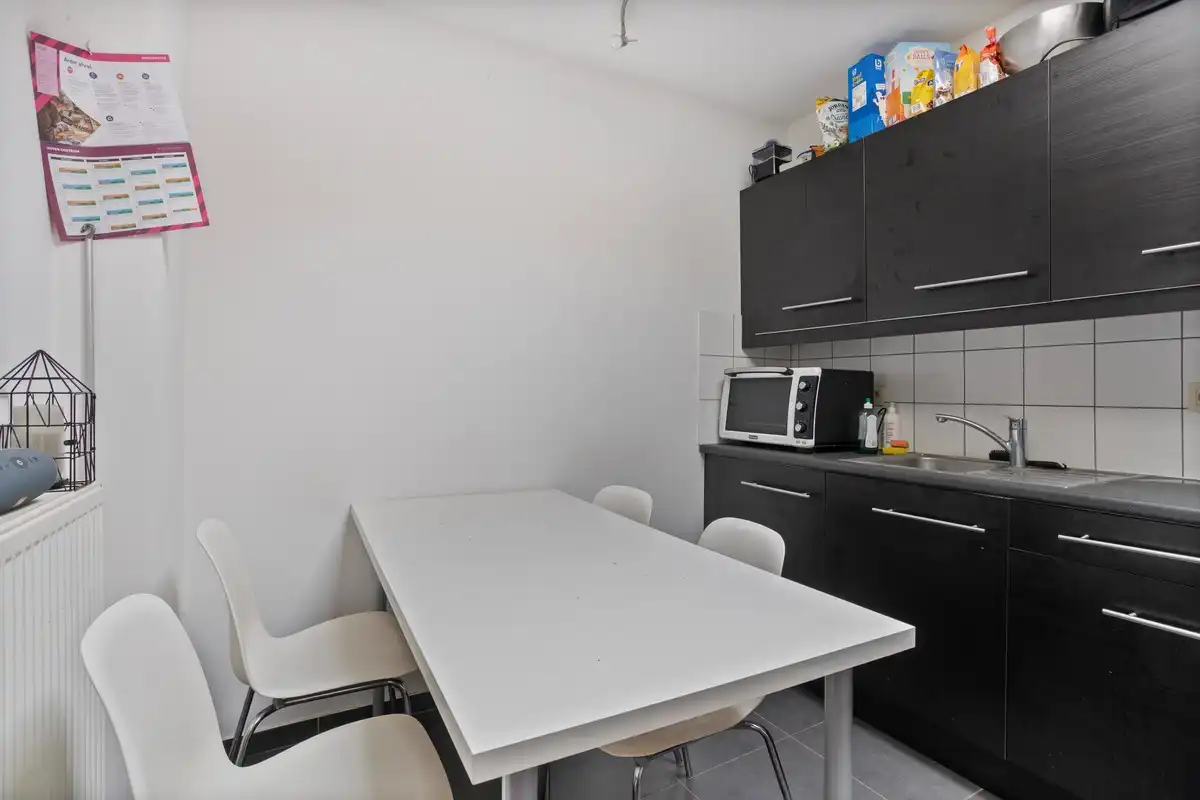 Opbrengsteigendom met 5 studentenkamers op toplocatie in hartje Leuven foto 12