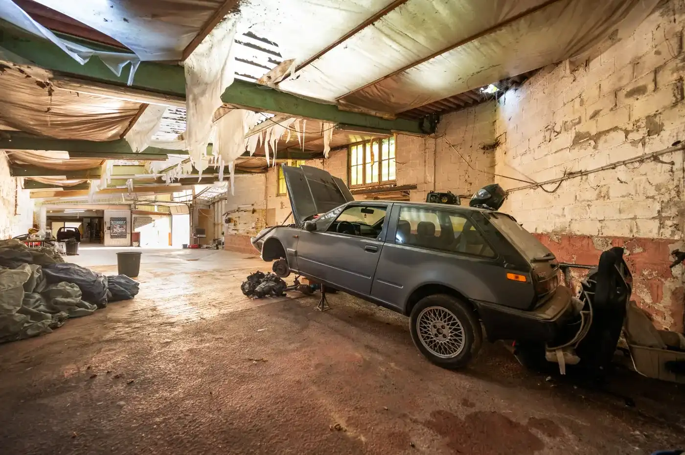 Verder te renoveren woning met grote hangar met 3 slpks foto 22