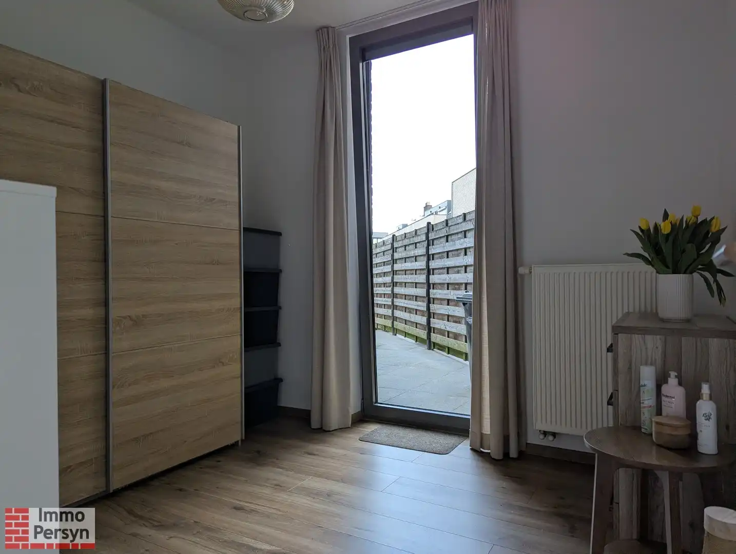 Gelijksvloer appartement met tuintje foto 18