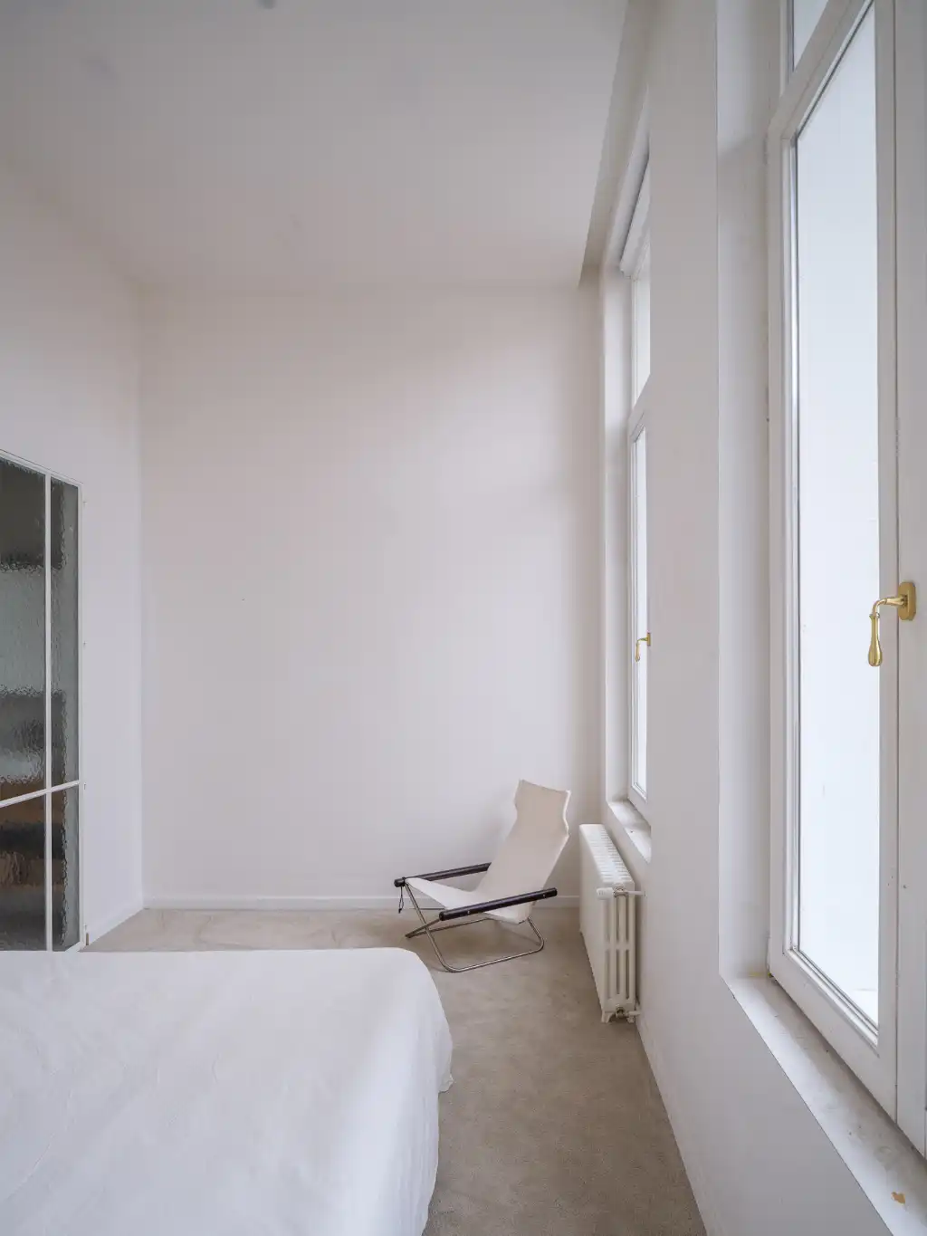 Gerenoveerd tweeslaapkamerappartement met zonnig terras in een voormalige herenwoning, nabij het historisch centrum van Gent. foto 18