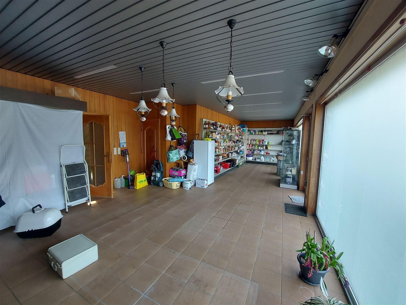 Veelzijdig renovatiepand met woonst en winkel Vloesberg foto 16