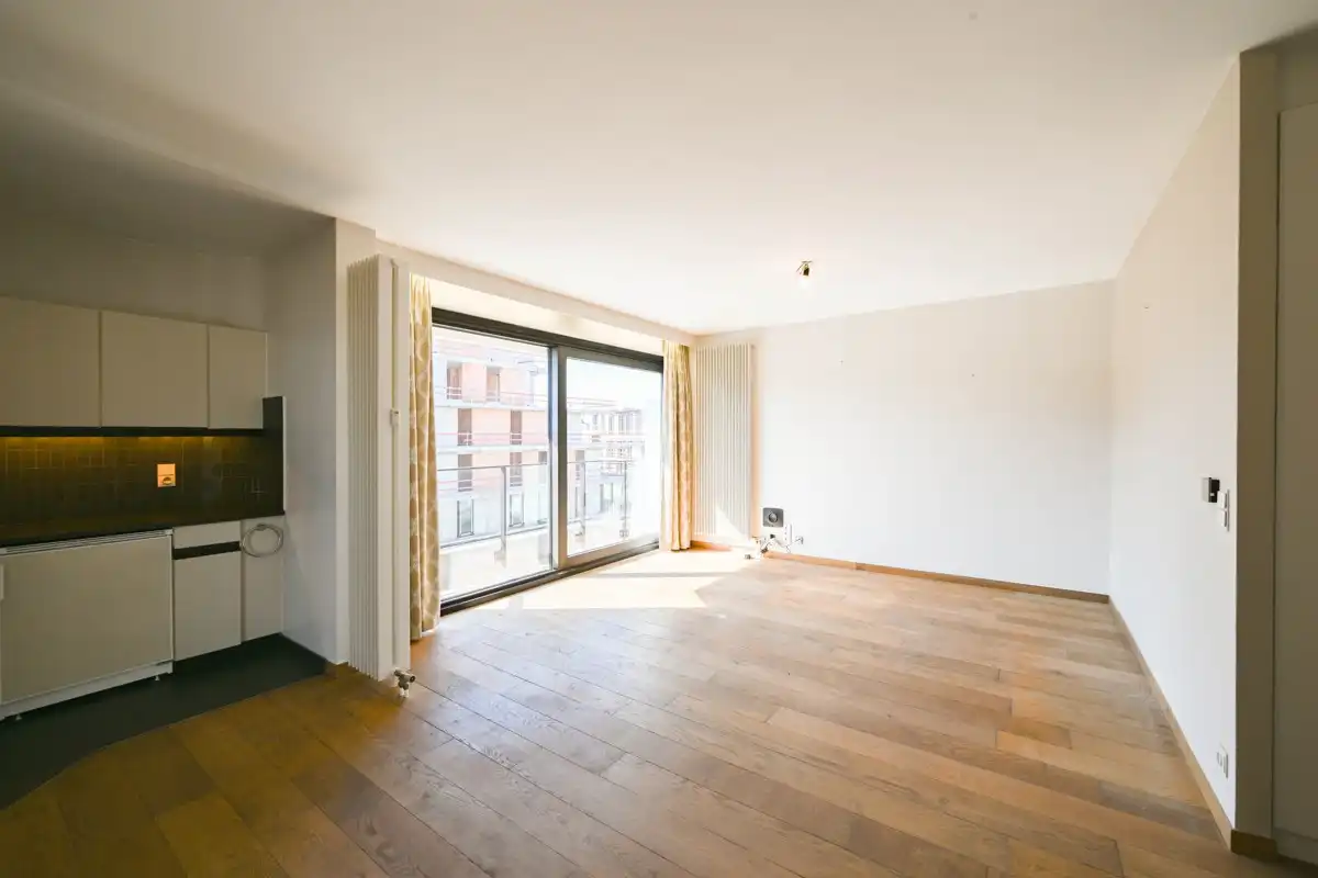 Ruim 1 slaapkamer appartement met zijdelings zeezicht en aankoopmogelijkheid tot een dubbele garage! foto 2