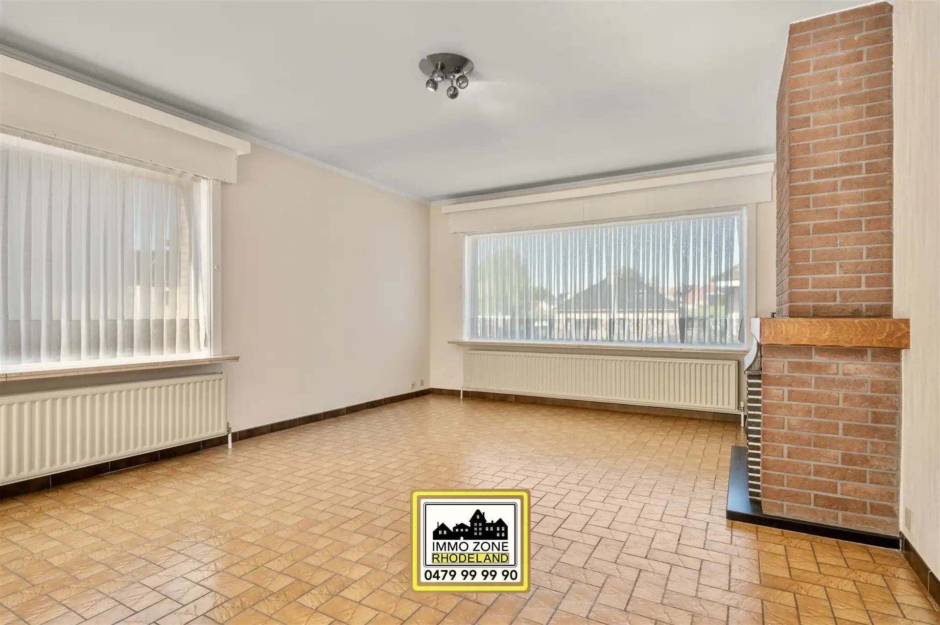 Op te frissen halfopen woning met 3 slpks, garage en tuin foto 5
