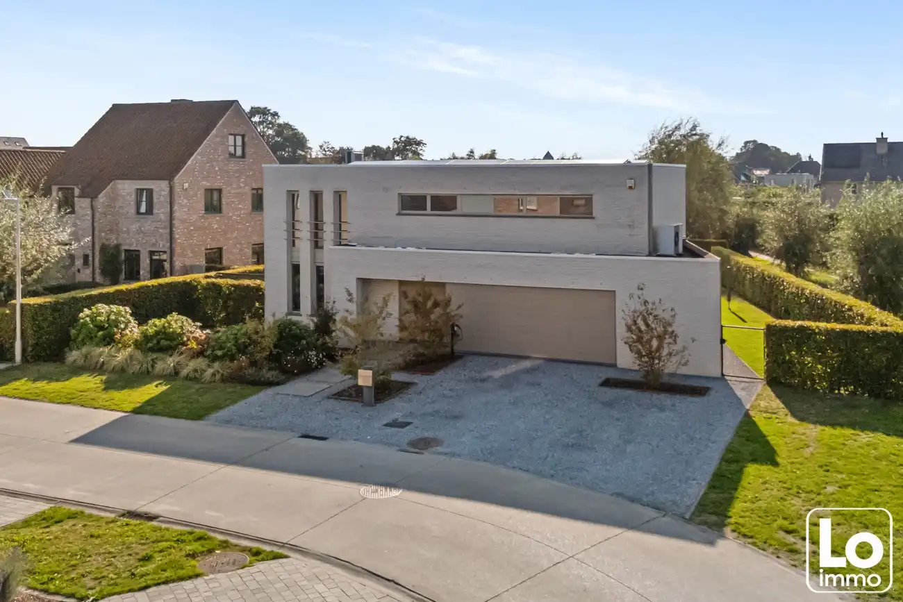 Instap klare moderne open villa met dubbele inpandige garage en een gezellige tuin op een toplocatie nabij het centrum van Lochristi! foto 5