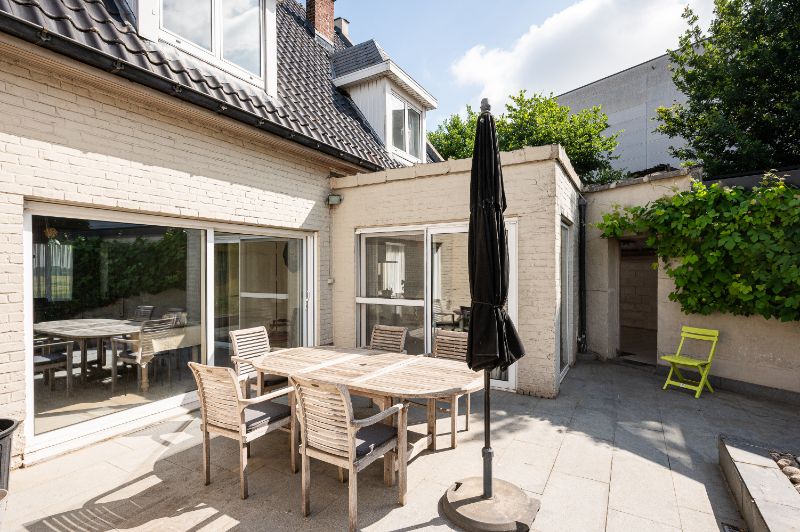 Goed onderhouden woning met zonnig terras en leuke tuin foto 4