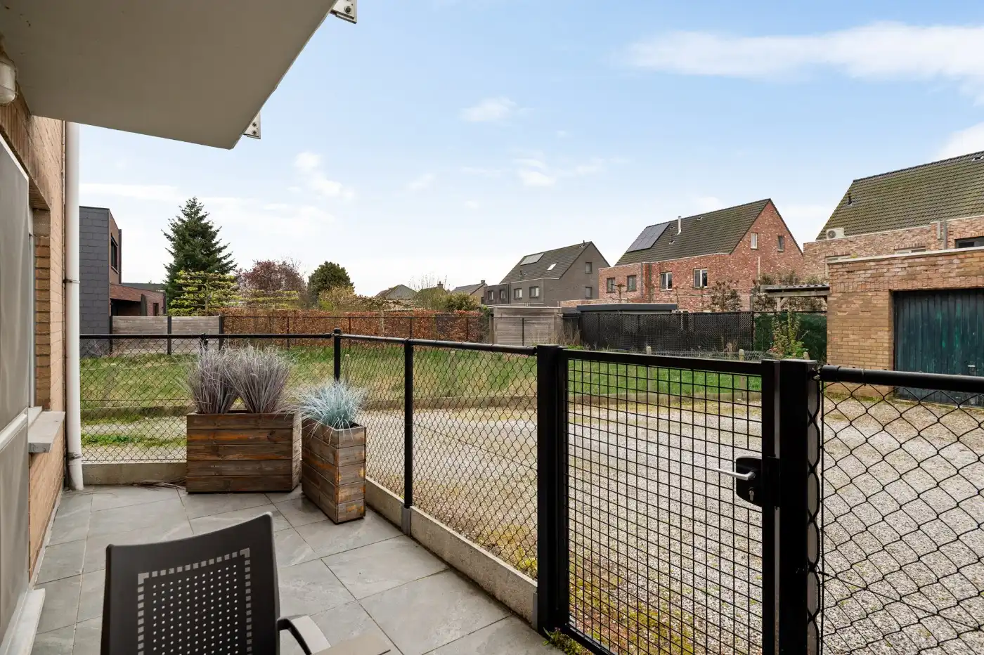 Keurig gelijkvloers appt. met 2 slpk., terras, voortuintje en garagebox foto 20