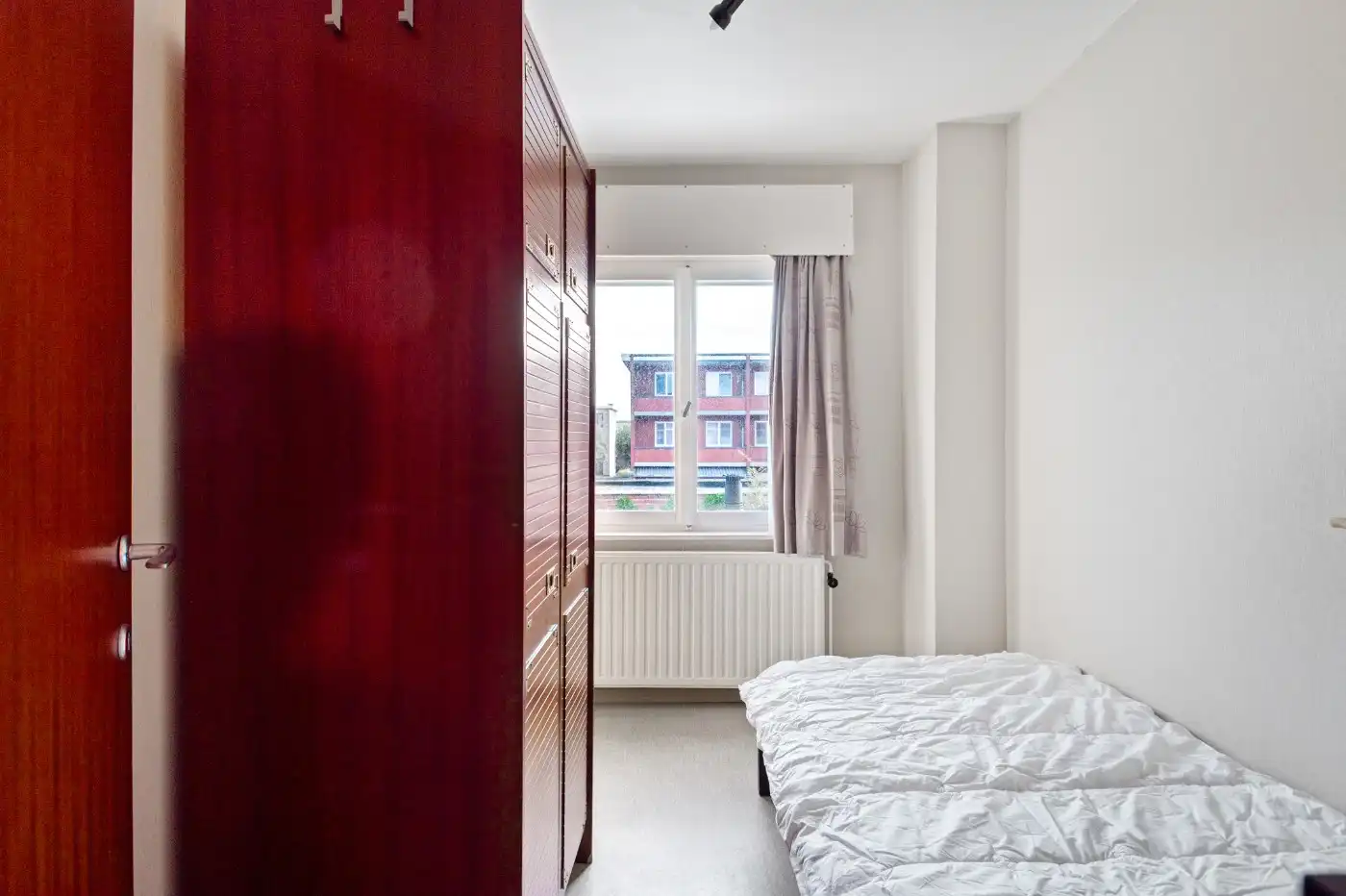 Prima onderhouden woning met 3 à 4 slpk., tuin én mog. garagebox foto 15