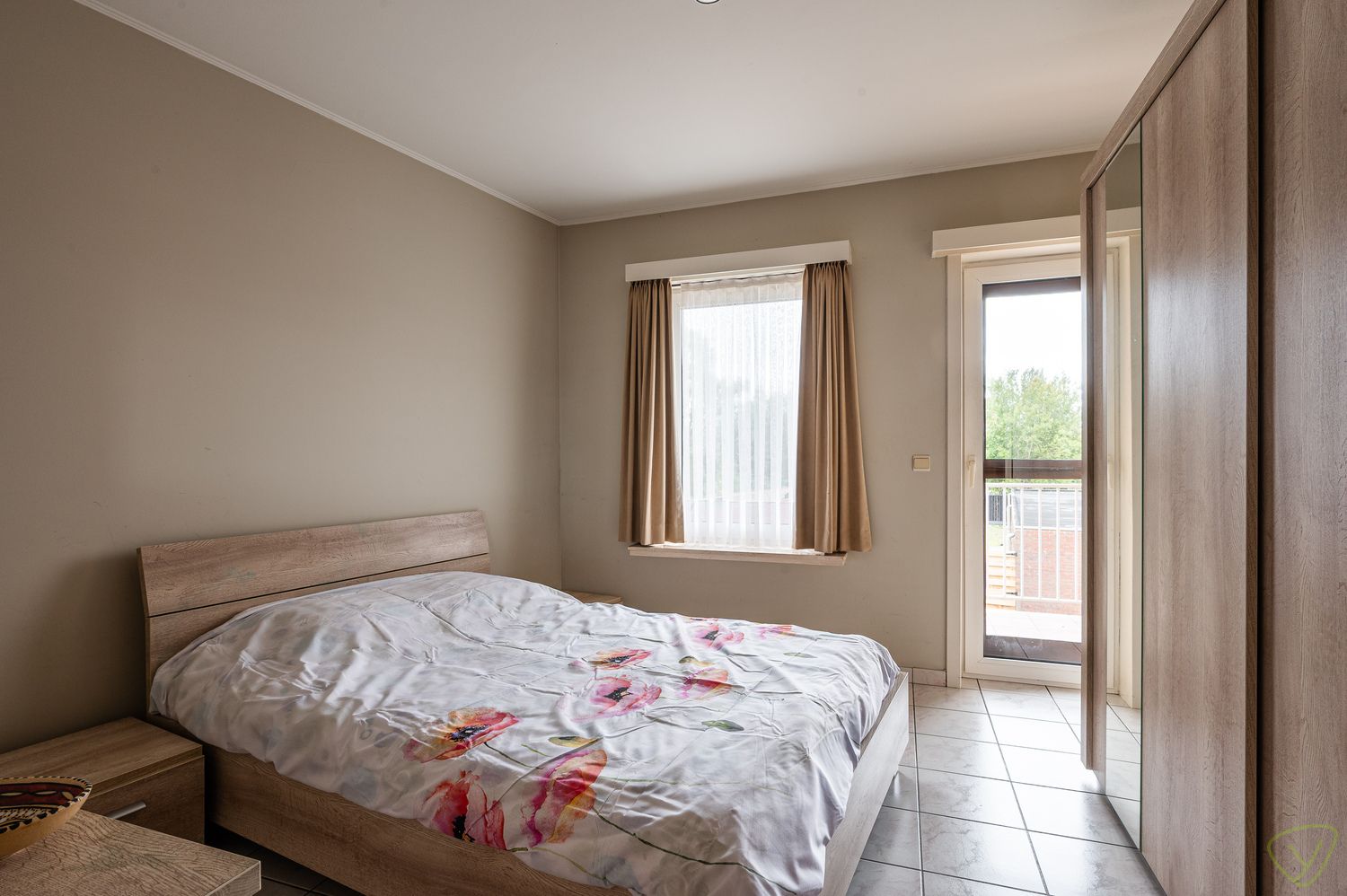 Zonnig en instapklaar appartement gelegen in de dorpskern van Kaprijke. foto 9