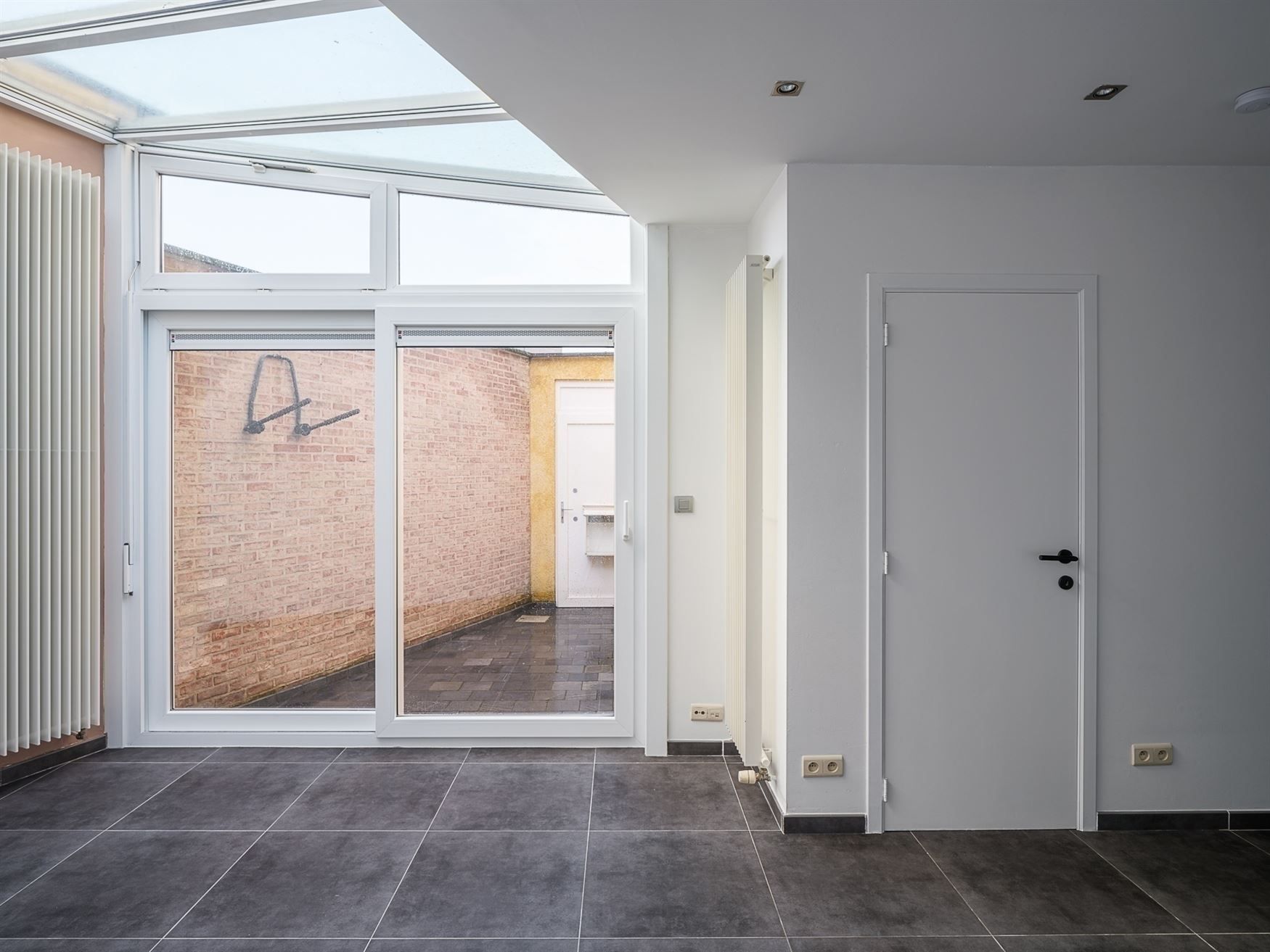 Hippe stadswoning met zonnige koer foto 2