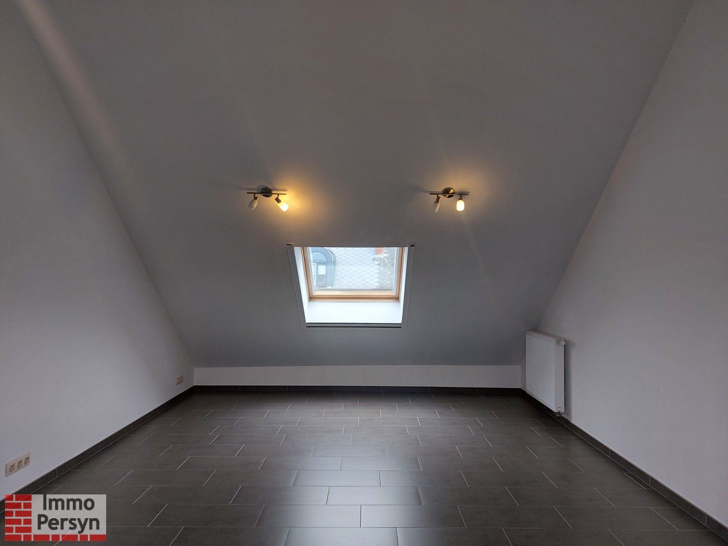 Gezellige rijwoning met kleine stadstuin foto 26