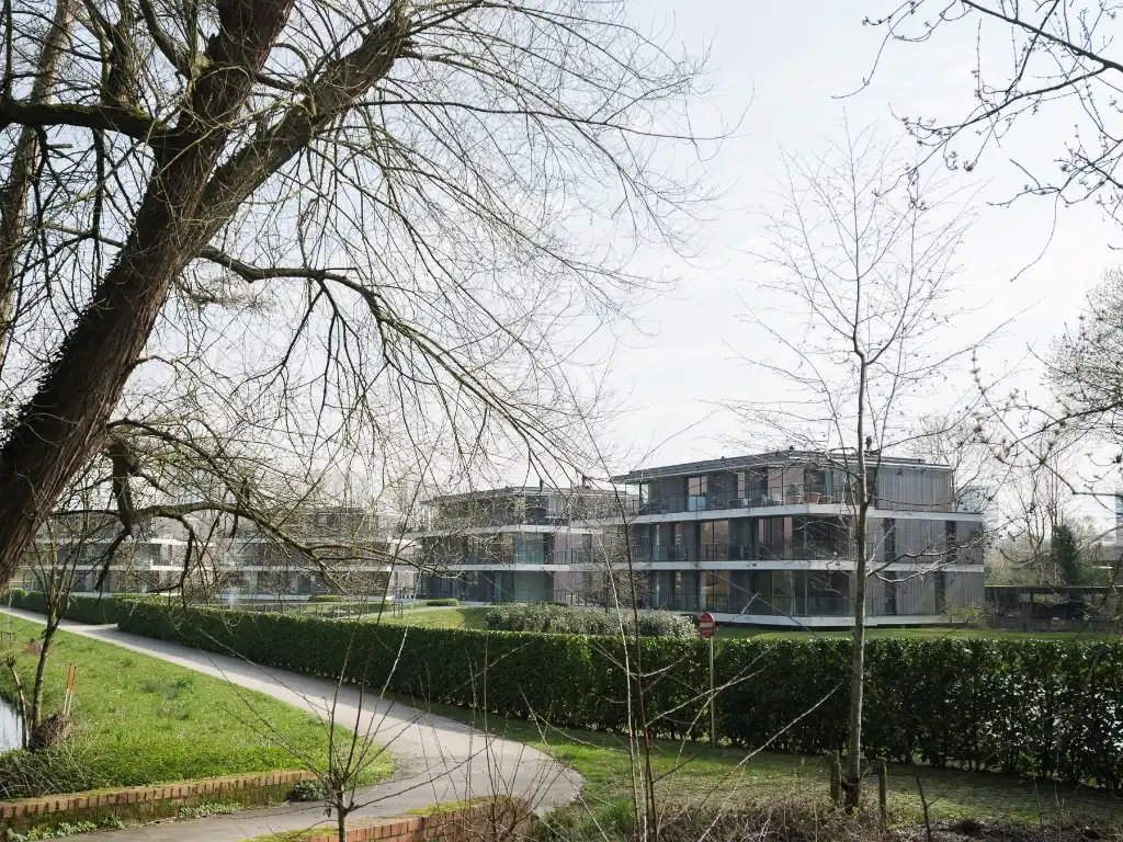 Lichtrijke penthouse met 3 slaapkamers, ruim zonneterras en twee overdekte staanplaatsen met groen uitzicht op fietsafstand van het centrum van Gent. foto 21