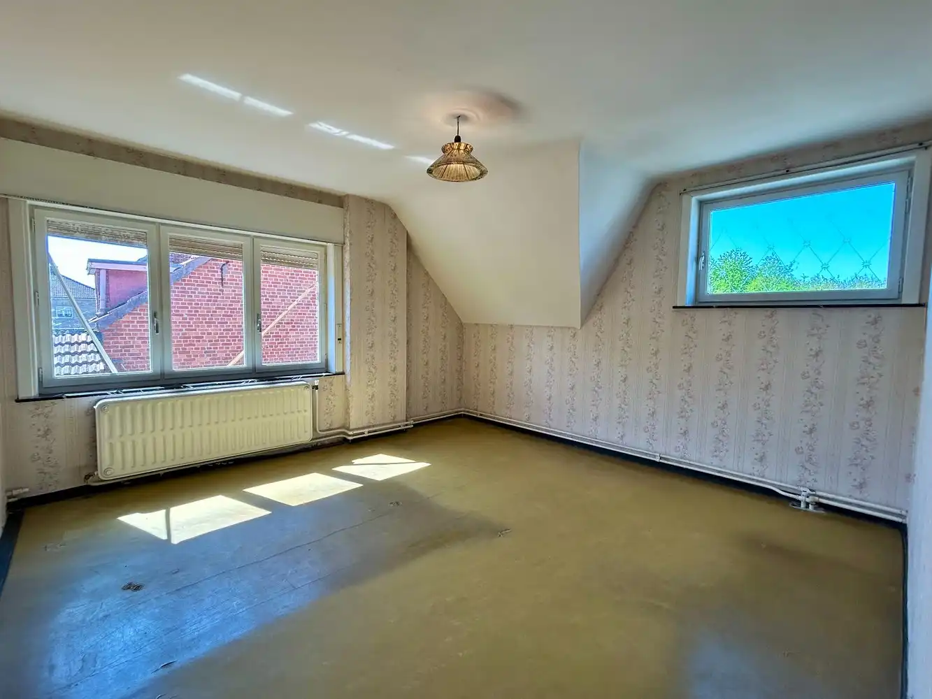 Te renoveren woning op bijna 30 are in Rotselaar foto 14