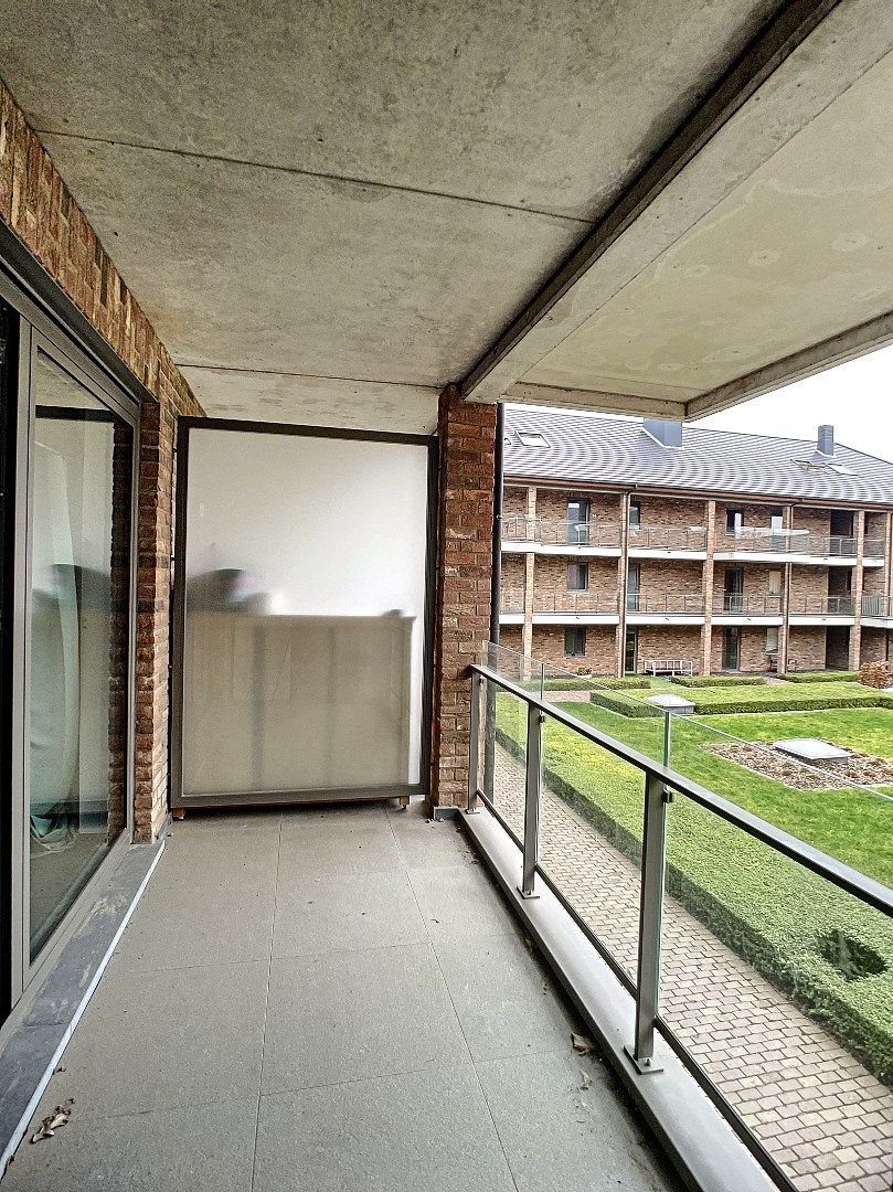 Instapklaar appartement met terras en lift in centrum Hoegaarden! foto 9