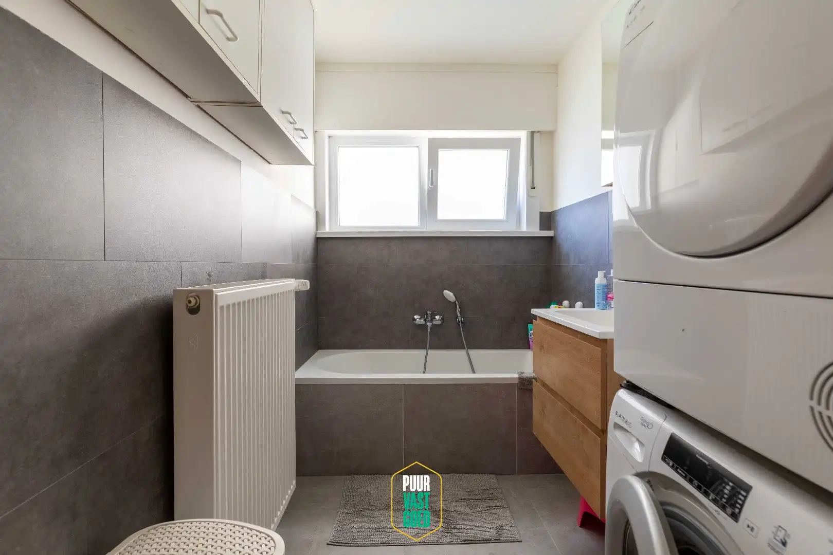 Ruim en verzorgd gelijkvloers appartement met terras foto 12