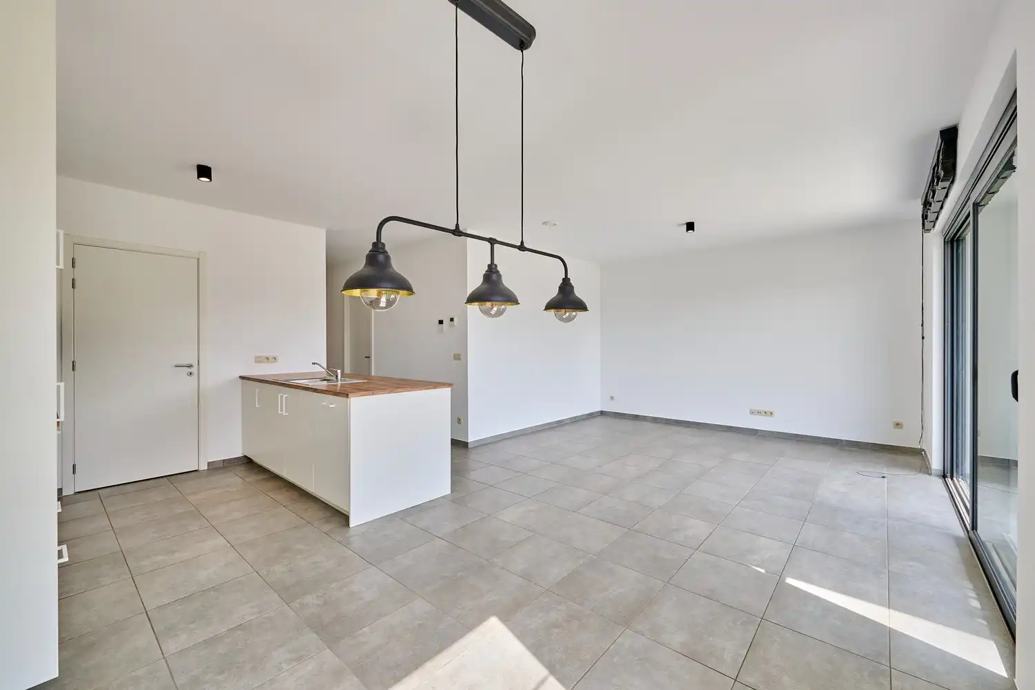 Stijlvol gelijkvloers appartement met zongerichte tuin - EPC11! foto 3