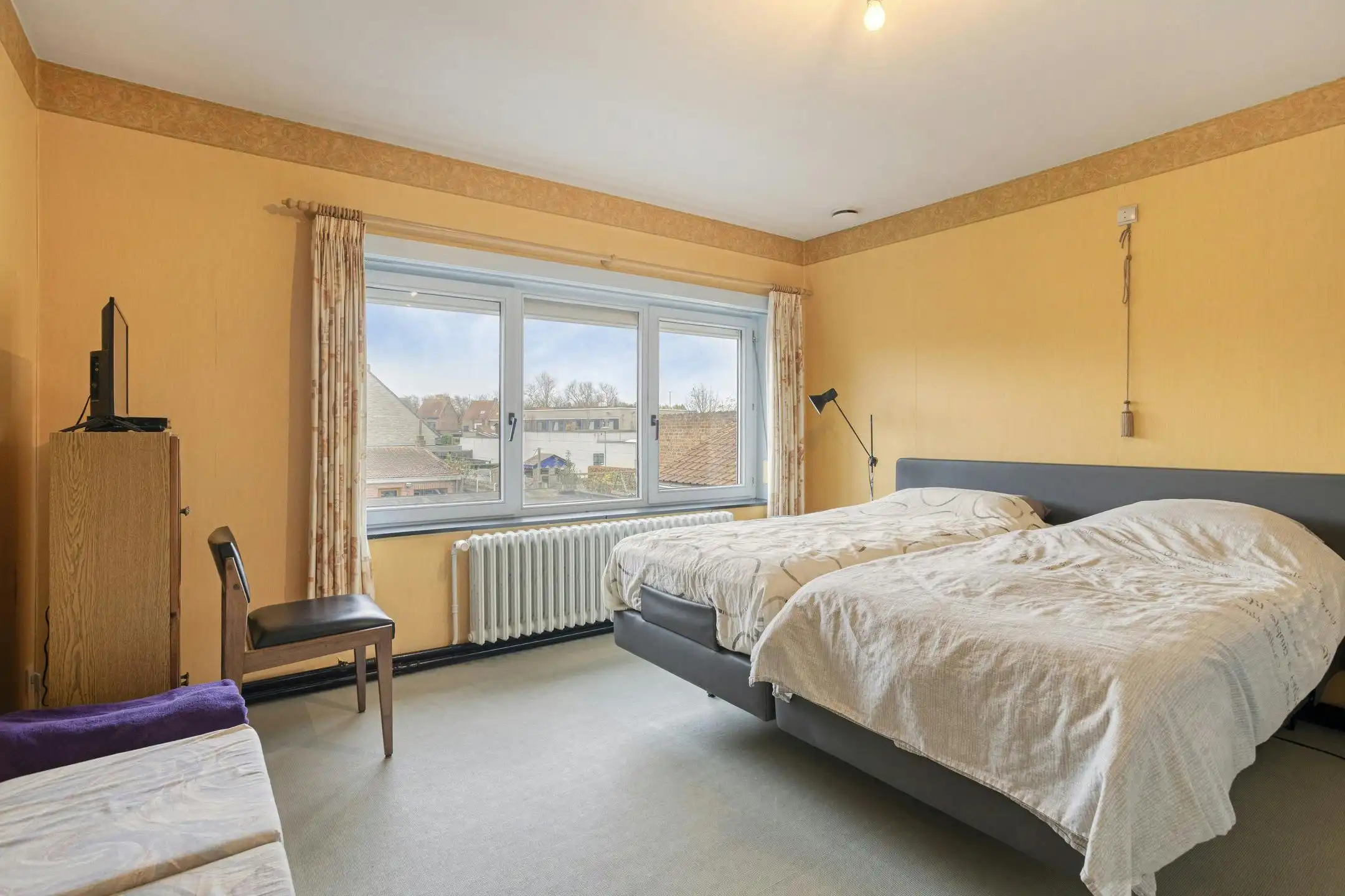 Instapklare woning met 3 slaapkamers, 2 badkamers, zuidgerichte tuin en garage. foto 6