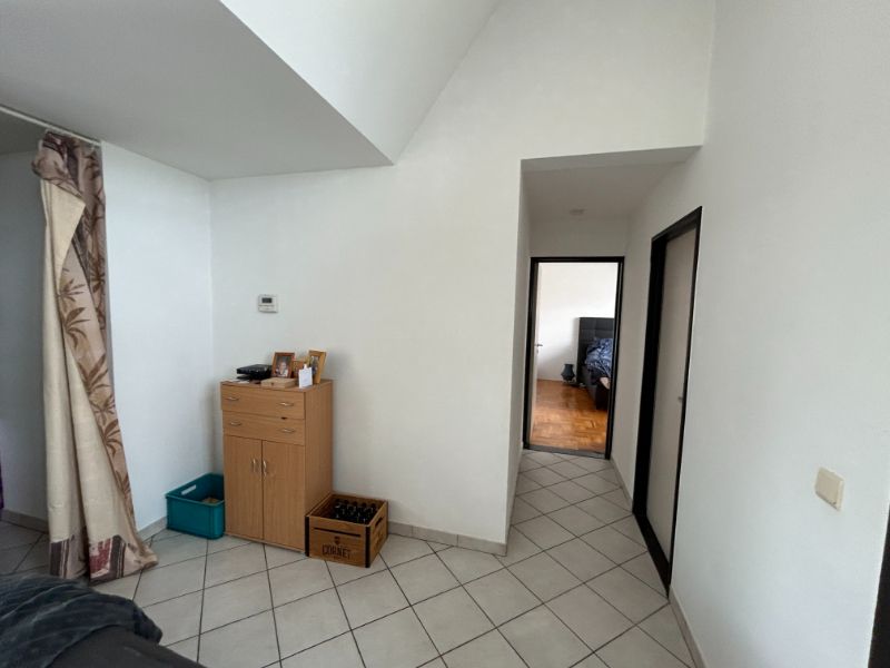 Prachtig 1 slpk dakappartement met terras (±40m²), garage en lift. foto 3