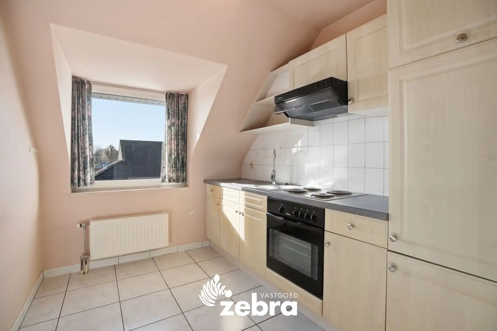 Op te frissen twee­slaapkamerappartement met terras in Lauwe foto 11