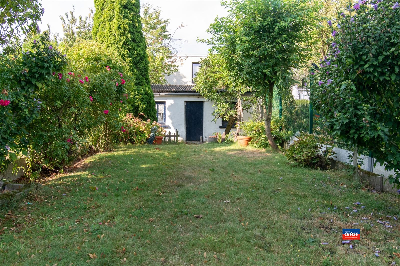 Rijwoning met 3 slaapkamers en gezellige tuin foto 11