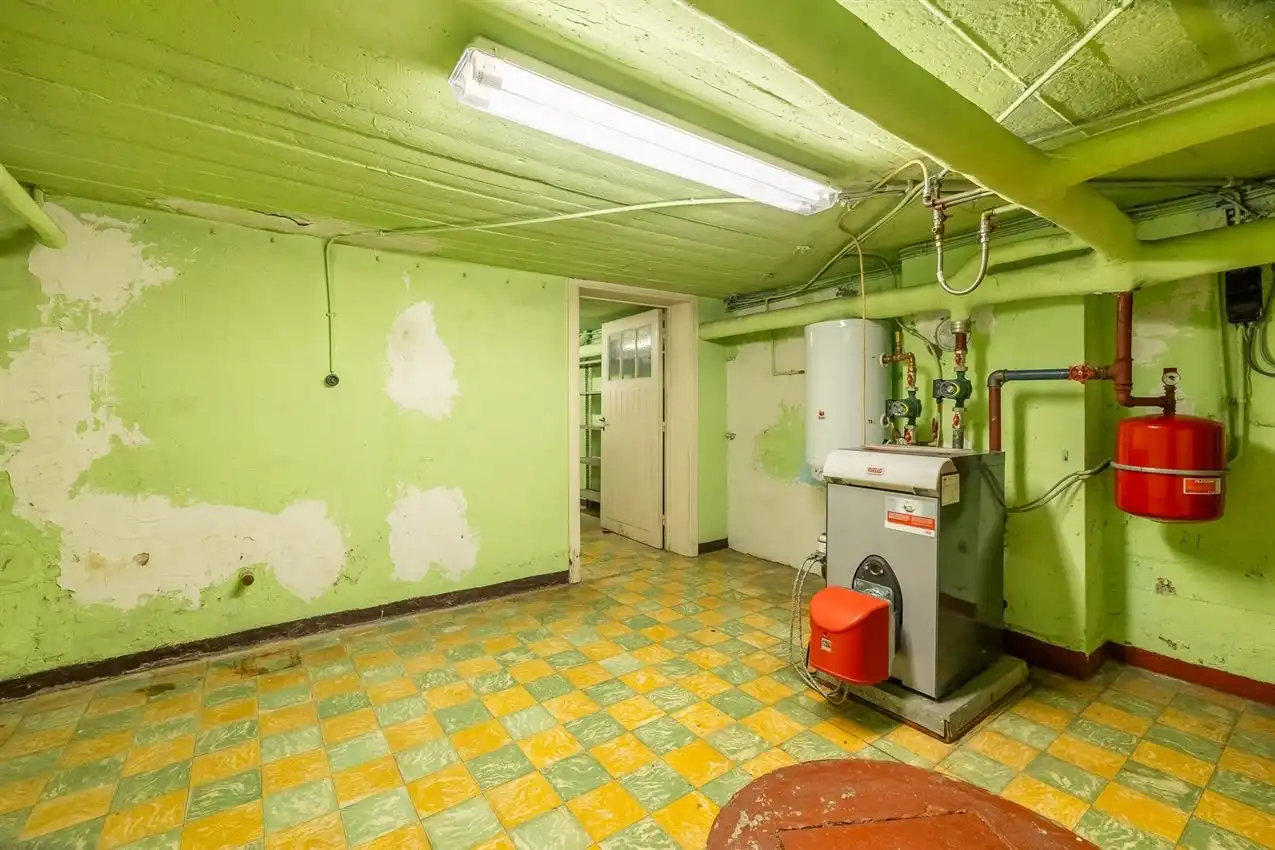 Karaktervolle vrijstaande woning met uitbreidingspotentieel in centrum foto 32